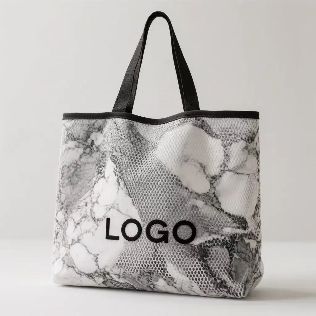 knitted bag laid flat with inspection zones marked as outer face, inner face, base and handle on a paper template